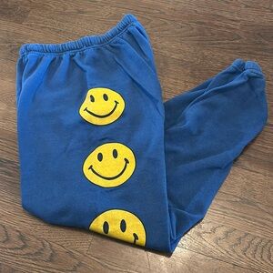 Aviator Nation smiley, navy sweatpants. Like new. Adult small.